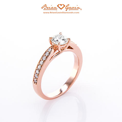 Cathedral style engagement ring in rose gold
