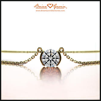 18k yellow gold, half bezel style solitaire