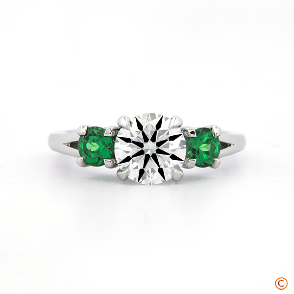 Three stone setting with AAA Faceted Green Tsavorite Garnets Side-stones