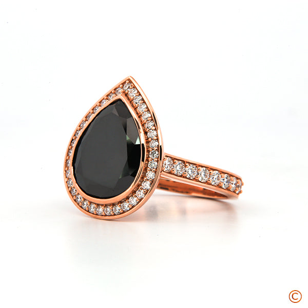Custom Milgrain Halo featuring 7 carat BLACK colored pear diamond