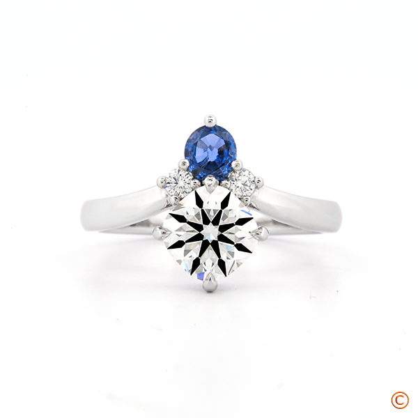 Custom Four Stone Engagement Ring set with a special Montana Sapphire