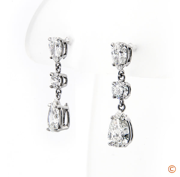 Custom made Platinum Three Stone Dangle Style Earrings