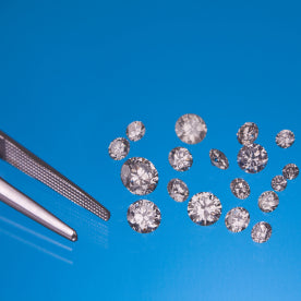 How will F-G color side stones look next to an I color center stone diamond?