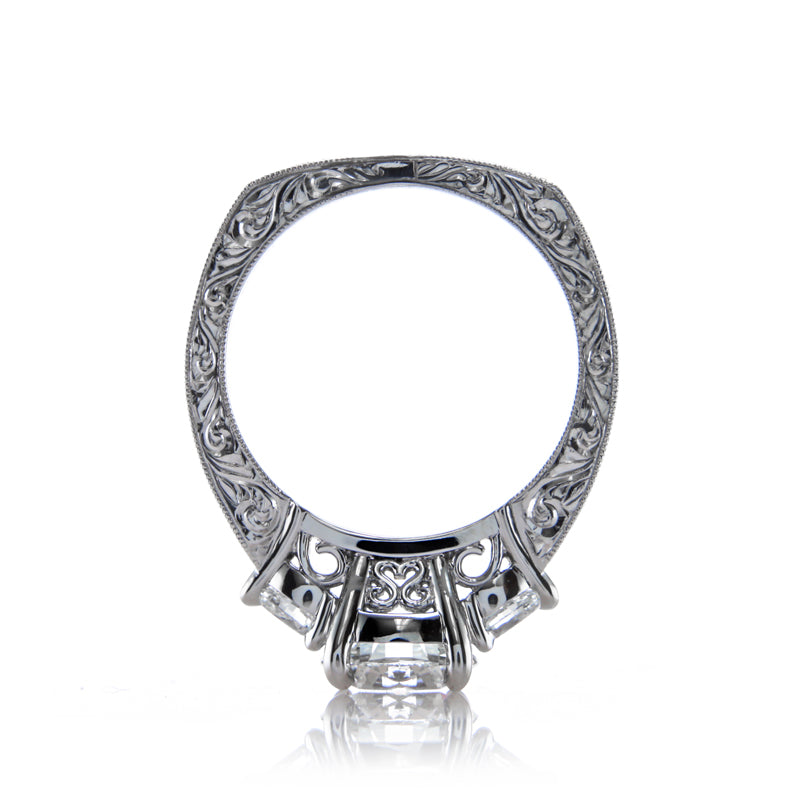 Custom 3 Stone Diamond Ring featuring Pear Shaped Side Stones and Hand Engraving