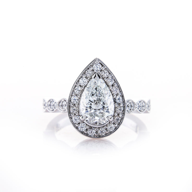 Custom Antique Halo Setting with a Euro-shank and Milgrain Accents Down the Band