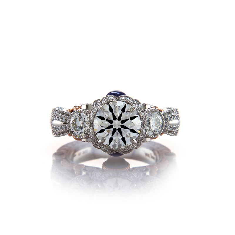 Custom Halo Style Three Stone Ring featuring Many Types of Gemstones