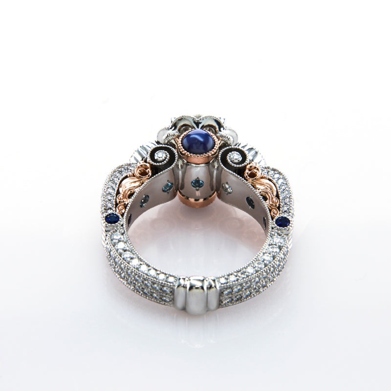 Custom Halo Style Three Stone Ring featuring Many Types of Gemstones