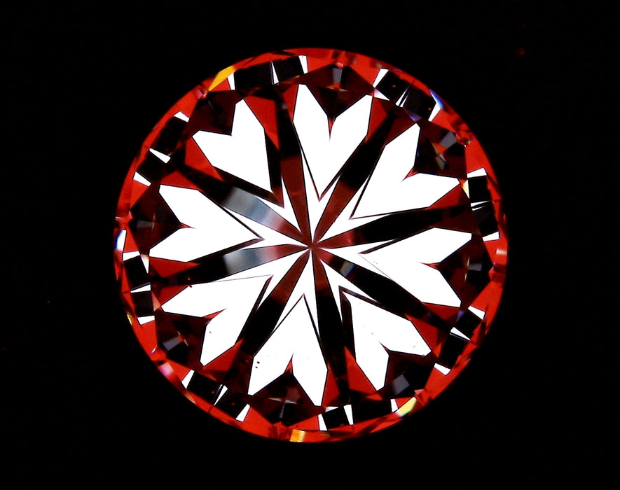 3.53ct Round I VS2 Natural Diamond hearts image