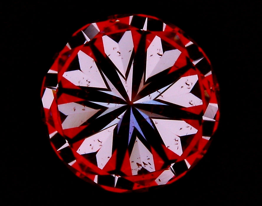 0.91ct Round F SI1 Natural Diamond hearts image