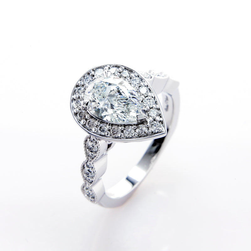 Custom Antique Halo Setting with a Euro-shank and Milgrain Accents Down the Band