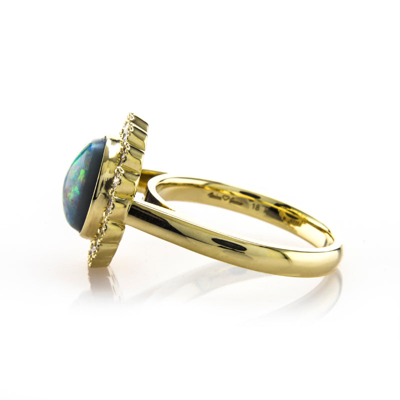 Custom Flower Inspired Design featuring a Multi-colored Opal