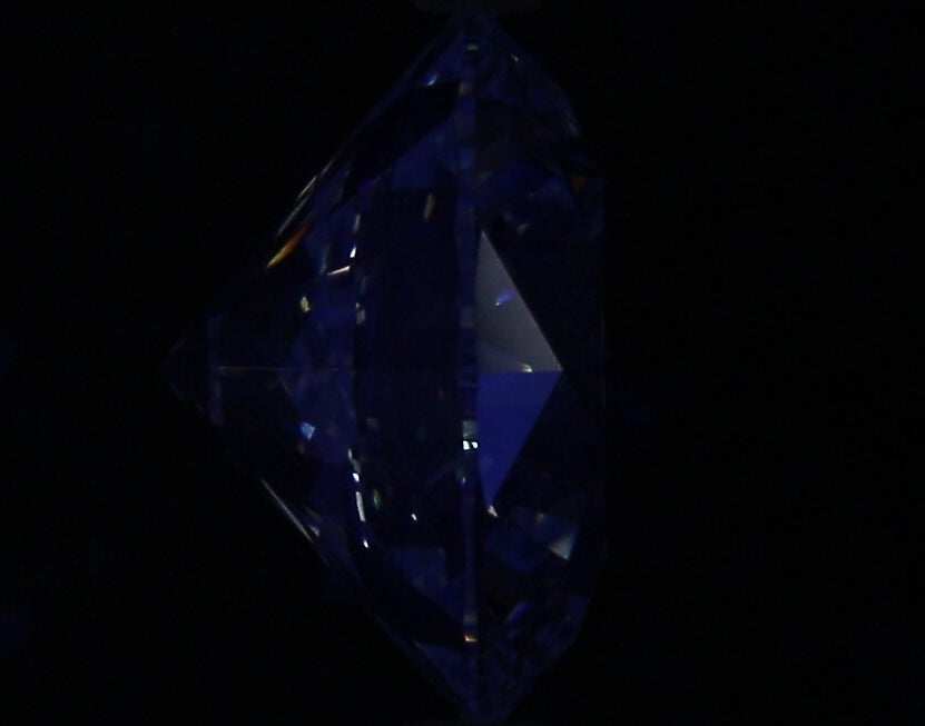 3.04ct Round I SI1 Natural Diamond fluorescence image