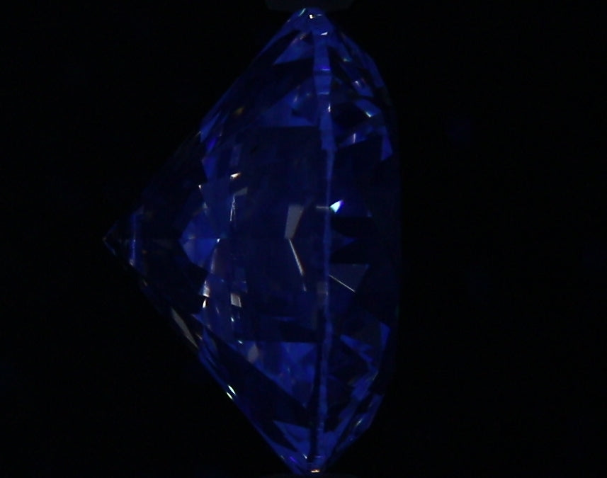 3.01ct Round F VS2 Natural Diamond fluorescence image